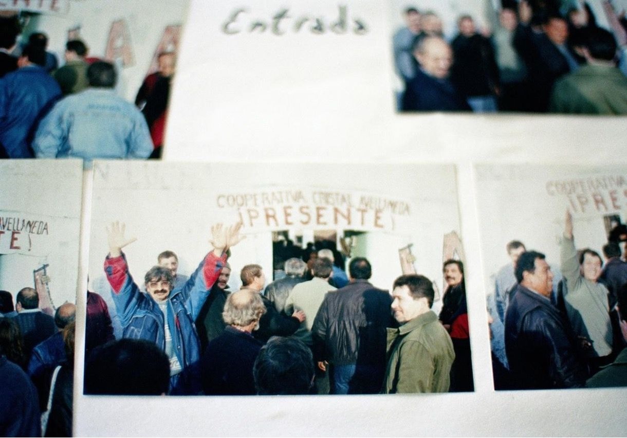 Workers celebrating in front of a recovered factory in Argentina